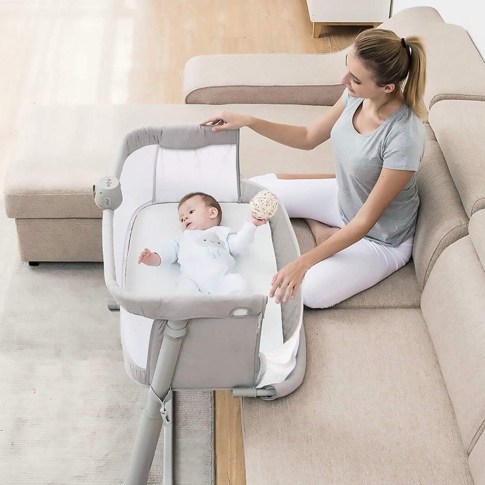 Baby Bedside Baby Bassinet, Best Bed Cribs for Infant Newborn, Portable Sleeper for Safer Co-Sleeping, Bed Crib Plus Hanging Figurine, Music, and Built-in Wheels - Girl Boy Unisex